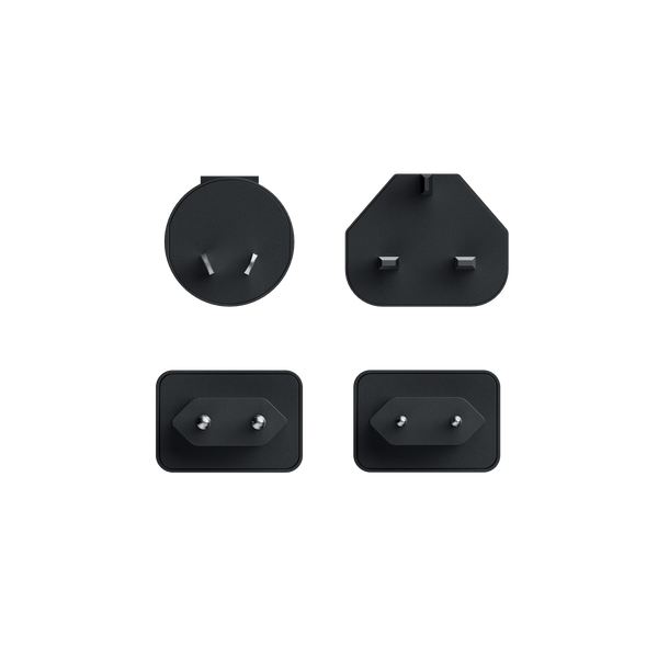 Set of four black electronic connectors on a white background